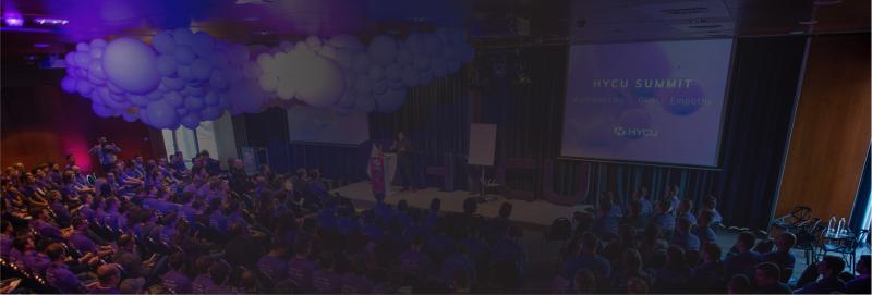 62f18b92ed8778539251ab21_625f0c34919841140f3a3892_HYCU-summit-overlay-darker.jpeg